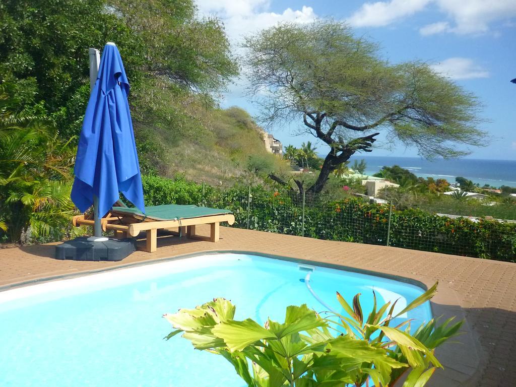Апартаменты Flamboyant Ocean View - Ex Hillside Haven Тамарин Экстерьер фото
